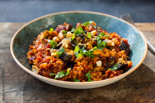 Принти на полотні Bulgur wheat tagine with aubergine and cashew nuts