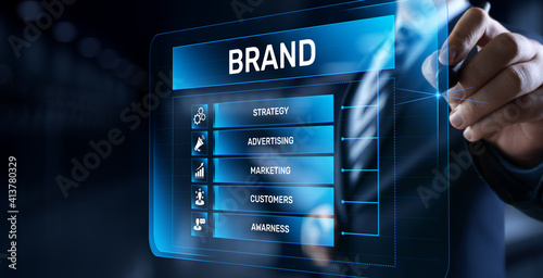 Brand development marketing strategy concept. Businessman pressing button on screen.