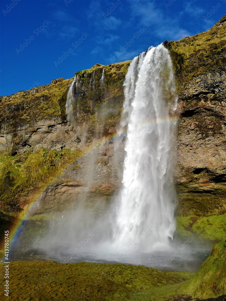 Icelandic waterfall with rainbow Icelandic waterfall with rainbow