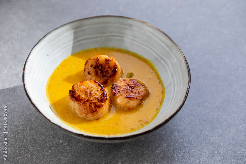 Scallops in spicy gulai sauce, Indonesian curry