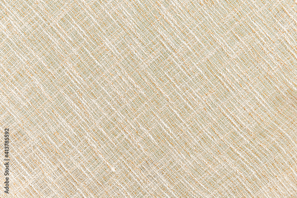 light yellow dense fabric with a relief, background, texture light yellow dense fabric with a relief, background, texture