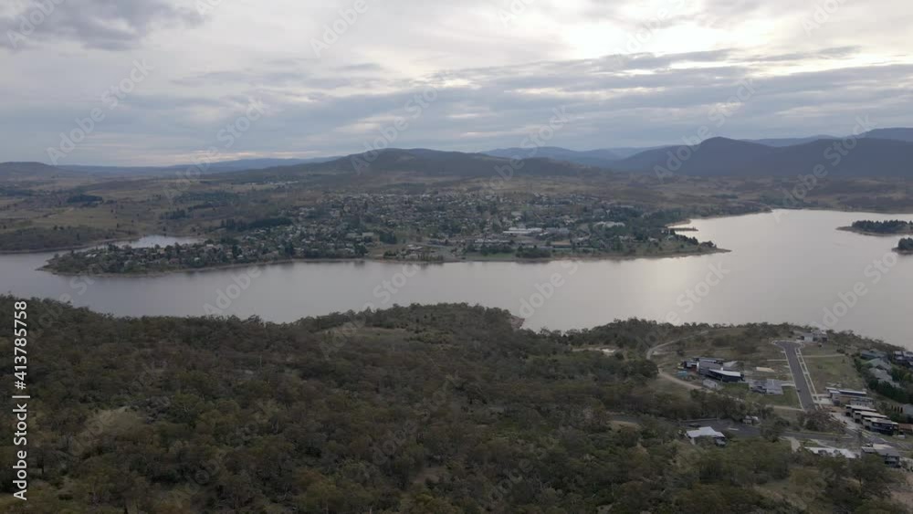 Aerial panning shot of mountain lake towns (Jindabyne, Tyrolean) Aerial panning shot of mountain lake towns (Jindabyne, Tyrolean)