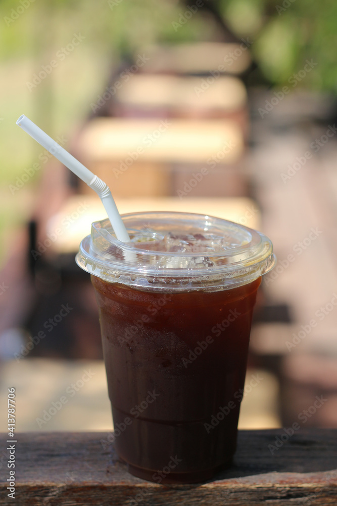 Iced americano coffee with ice on table at cafe. Iced americano coffee with ice on table at cafe.