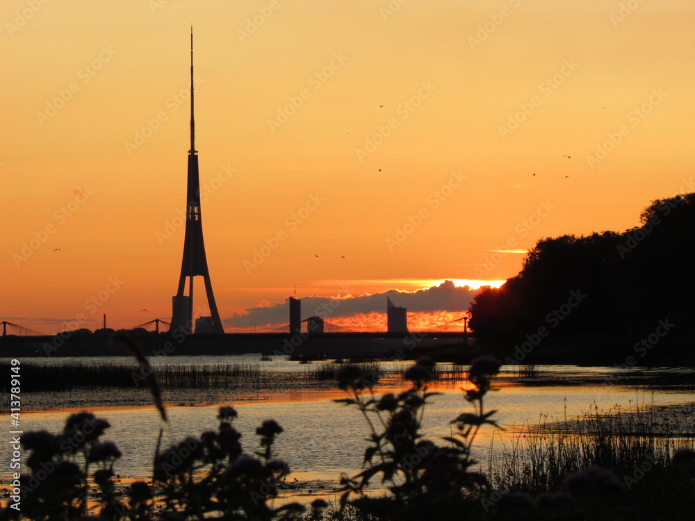 Fototapeta premium sunset on the river Daugava, Riga