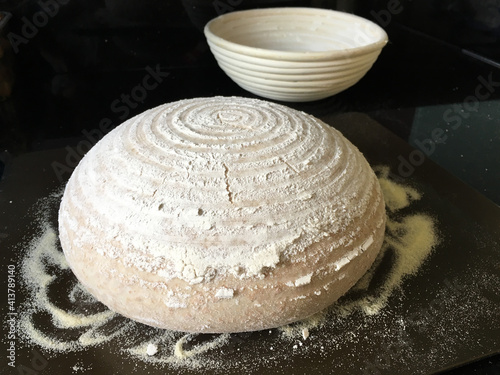 Sourdough bread dough shaped in a banneton ready to bake