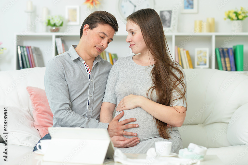 happy pregnant woman with husband happy pregnant woman with husband