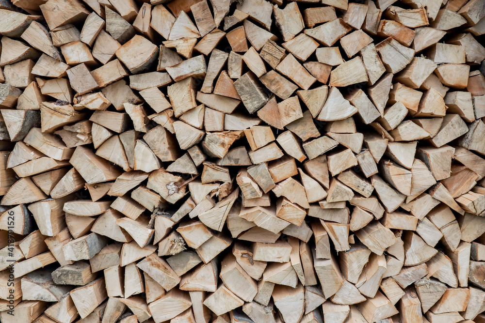 Stacks of Firewood. Preparation of firewood for the winter. Pile of Firewood.Firewood background Stacks of Firewood. Preparation of firewood for the winter. Pile of Firewood.Firewood background