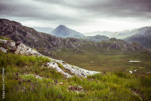 Dramatic landscape of light and cloud over mountains in scotland