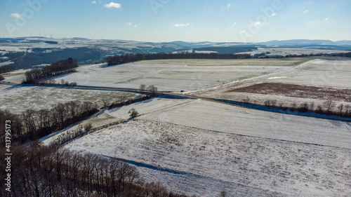 Aerial view of the landscape near the town of Meisenheim in winter with snow