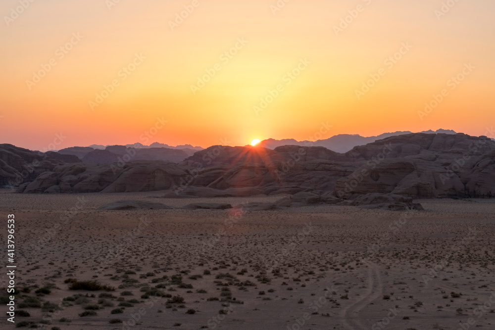 Rock outcrops at sunset in Wadi Rum Protected Area, Jordan Rock outcrops at sunset in Wadi Rum Protected Area, Jordan