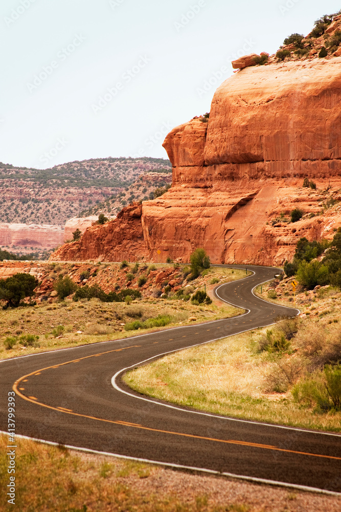 Road by rock formation against clear sky Road by rock formation against clear sky