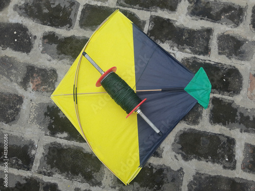 Indian kites and spool used in the very popular sport of kite fighting. These are traditionally used on Makar Sankranti or Independence day