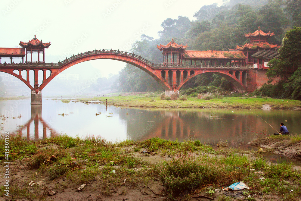 Ancient bridge against clear sky