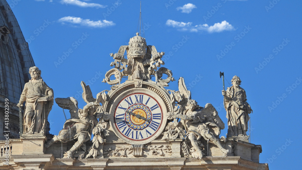 Zoom detail photo of main clock in Saint Peter Basilica, Vatican City, Rome, Italy