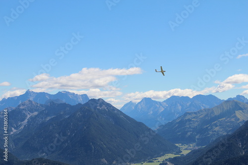 Plane flying above mountains