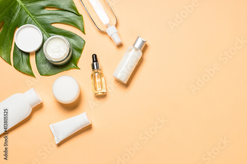 Natural cosmetic products at color background. Cream, mask, lotion for face and body care. Top view image with copy space.