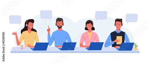 Group of workers with headsets are sitting at the computer