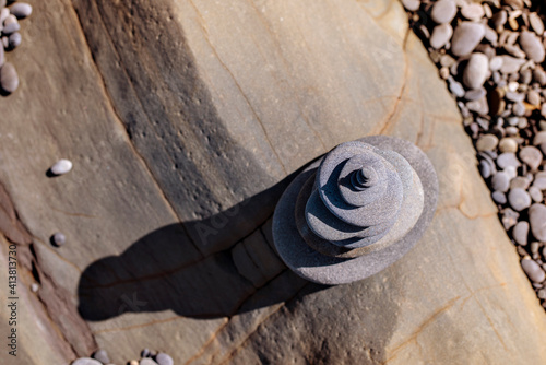 Overhead view of stack of stones on rock photo