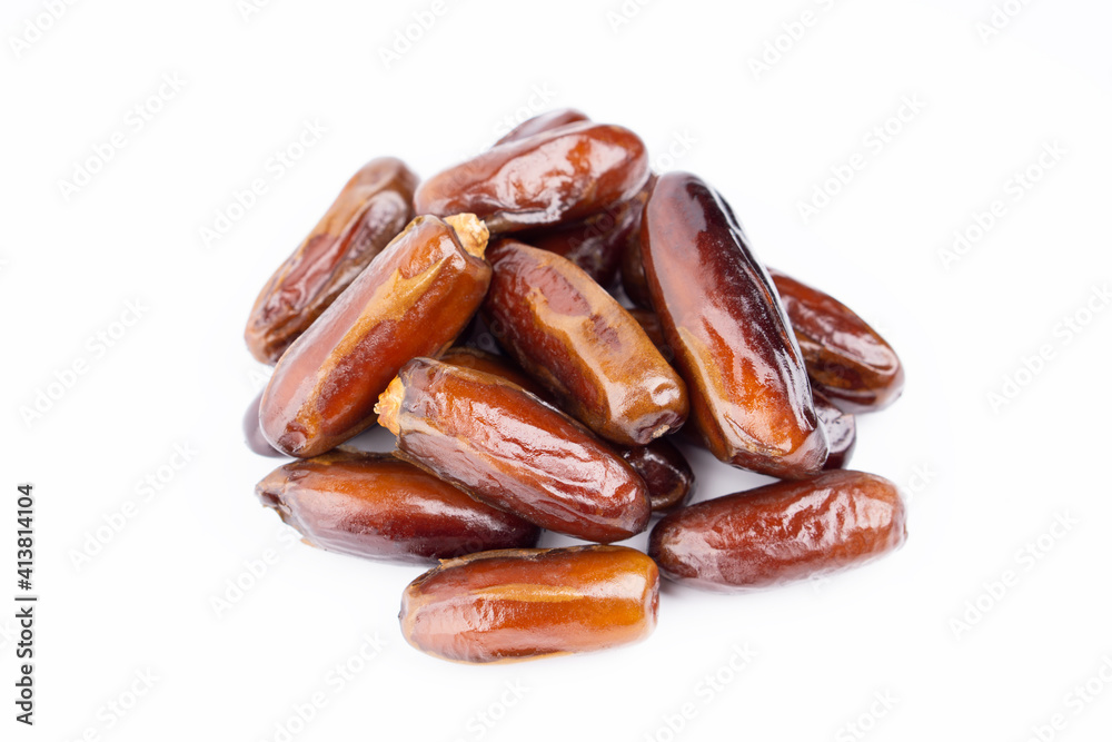 Creative layout made of dried dates. Flat lay. Food concept. Fruits dates. Dates Palm fruit isolated on white. Dried fruits. Healthy diet. Creative layout made of dried dates. Flat lay. Food concept. Fruits dates. Dates Palm fruit isolated on white. Dried fruits. Healthy diet.