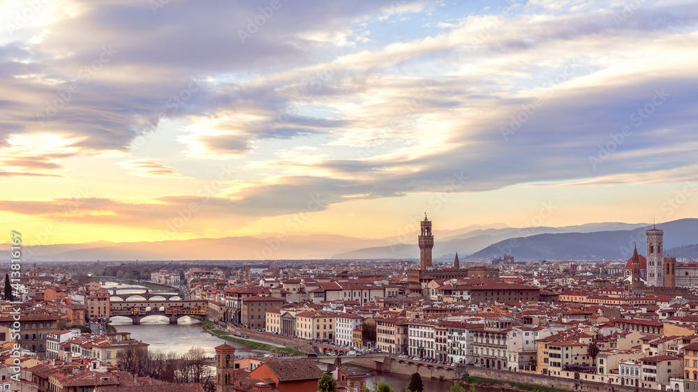 Panoramic view of the historic center of Florence and Palazzo Vecchio, Florence Cathedral, Ponte Vecchio during sunset. Tuscany, Italy