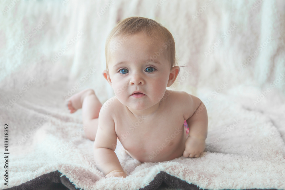 Little baby girl playing at home. Little baby girl playing at home.