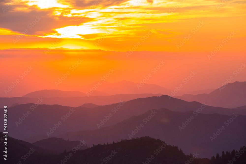 Looking down from Moro Rock in the Sequoia National Park California, USA, into the Central Valley, at sunset. Looking down from Moro Rock in the Sequoia National Park California, USA, into the Central Valley, at sunset.