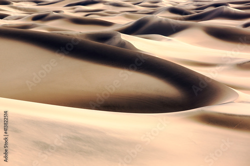 The Mesquite flat sand dunes in Death Valley which is the lowest, hottest, driest place in the USA, with an average annual rainfall of around 2 inches, some years it does not recei photo