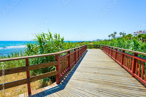 Wooden walkway in Calahonda Beach, Mijas, Malaga, Spain photo