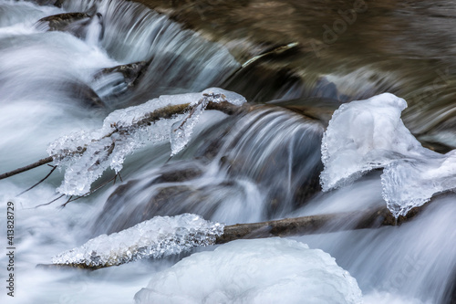 cascades in river raab in winter, austria photo