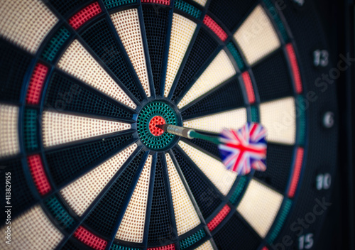 Dart with the UK flag on the bullseye. Success and accuracy concept