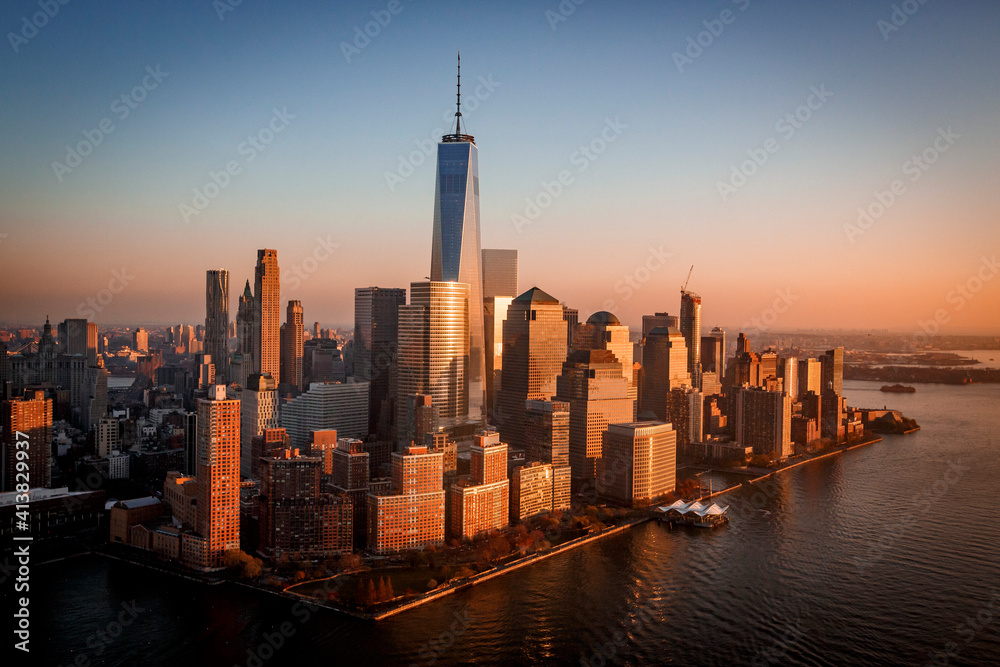 Sunset over Freedom Tower and New York City's Financial District. Sunset over Freedom Tower and New York City's Financial District.