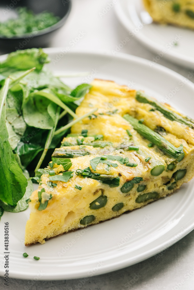 Asparagus frittata wedge close up Asparagus frittata wedge close up