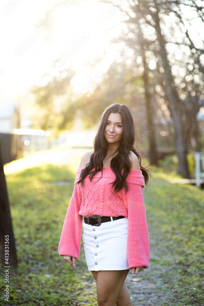 Beautiful brunette girl in pretty light in the woods. Beautiful brunette girl in pretty light in the woods.