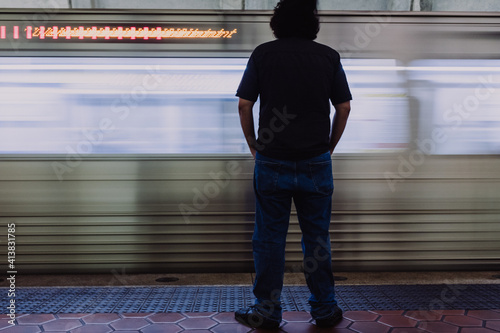 Man waiting for metro train