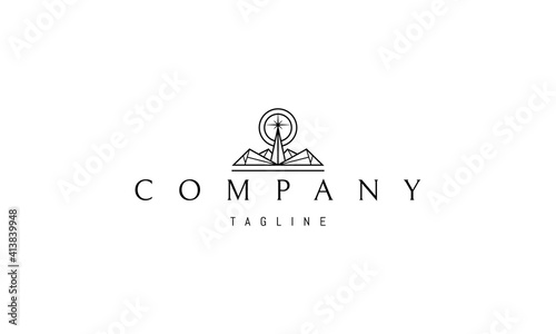 Vector logo on which an abstract image of a lighthouse on the rocks in a polygonal style.