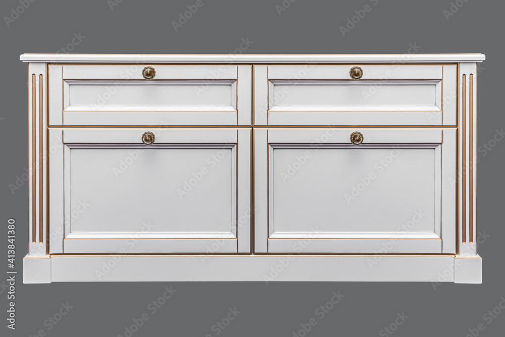 Classical white bedside table with drawers and crystal handles isolated on gray background Classical white bedside table with drawers and crystal handles isolated on gray background