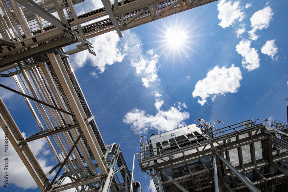 Natural gas plant structures against blue sky Natural gas plant structures against blue sky