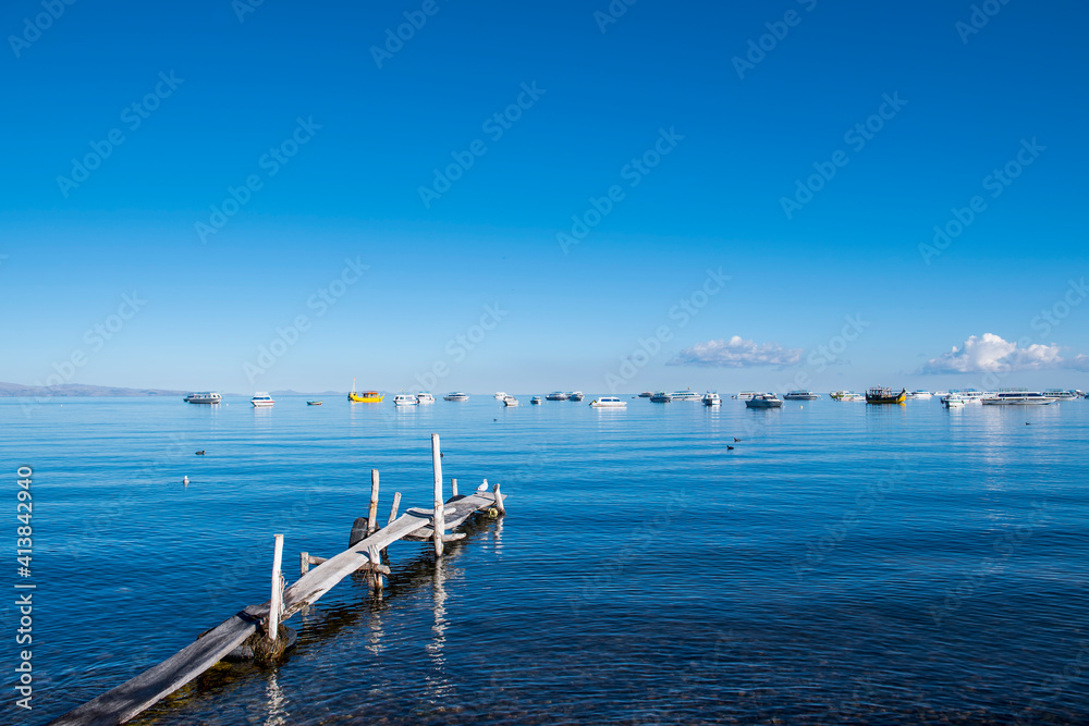 simple wooden pier at Lake Titicaca in Bolivia simple wooden pier at Lake Titicaca in Bolivia