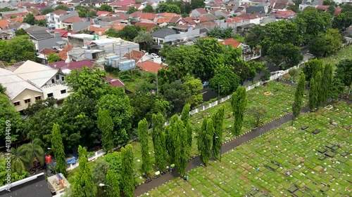 Aerial view residential area green cemetary in Jakarta