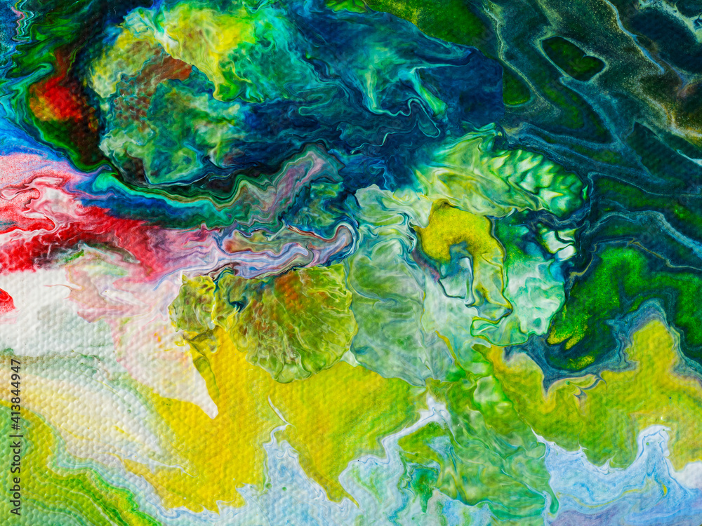 Beautiful abstract background. Pouring acrylic paint on canvas.