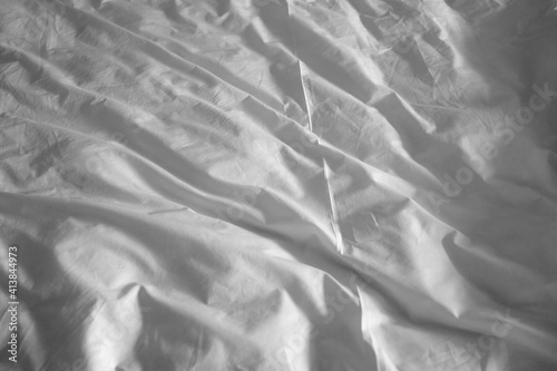 Full frame photo of the rumpled bed sheet