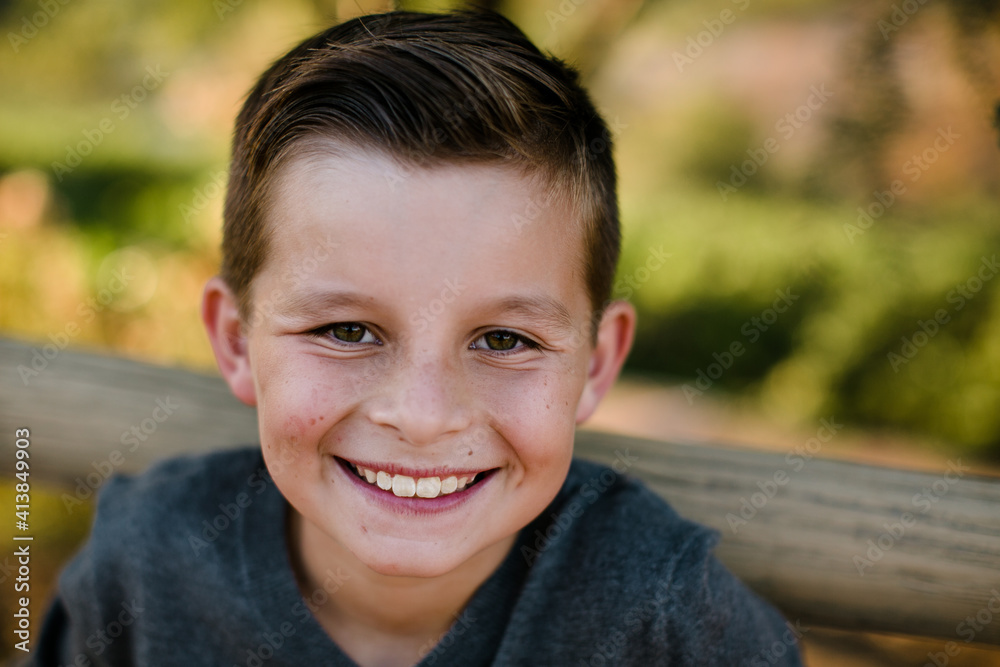 Young Boy Smiling at Camera in Southern California Young Boy Smiling at Camera in Southern California