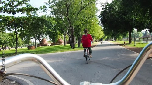 Wallpaper Mural Woman ride bicycle near temple in Thailand Torontodigital.ca