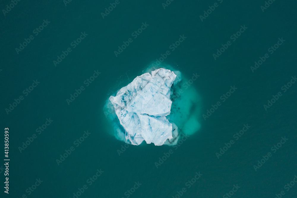 Ice between azure water Ice between azure water