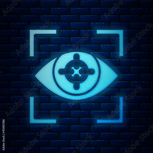 Glowing neon Eye scan icon isolated on brick wall background. Scanning eye. Security check symbol. Cyber eye sign. Vector.