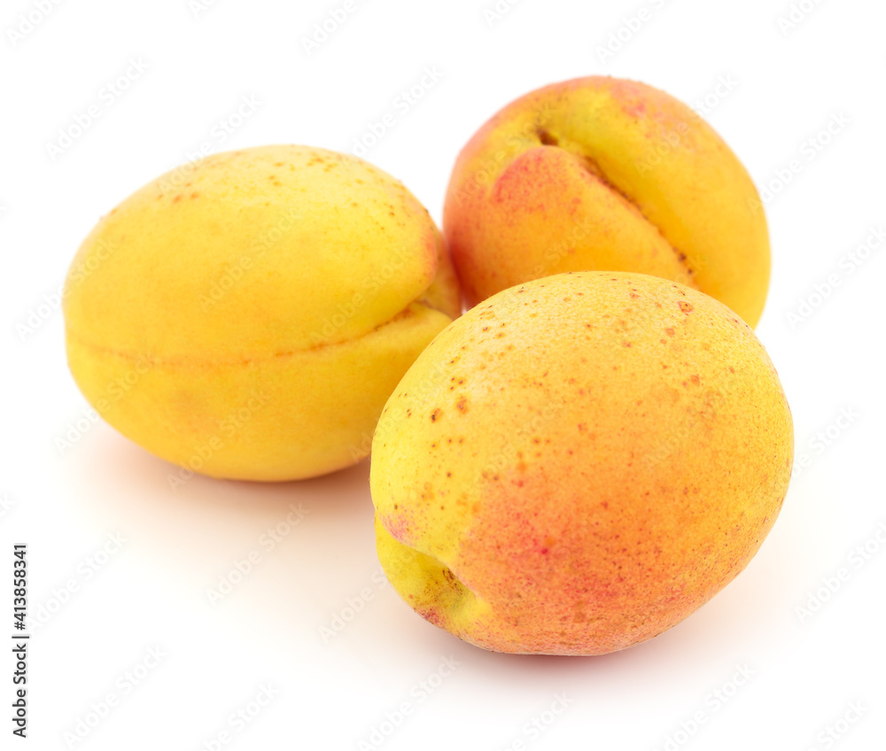 Three yellow apricots.