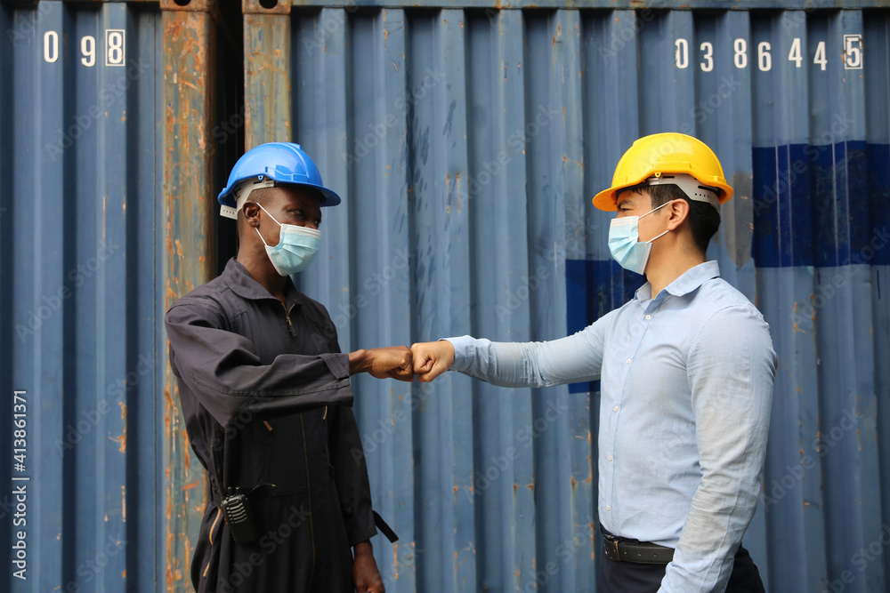 Factory industry worker working with face mask to prevent Covid-19 Coronavirus spreading during job reopening period . Factory industry worker working with face mask to prevent Covid-19 Coronavirus spreading during job reopening period .