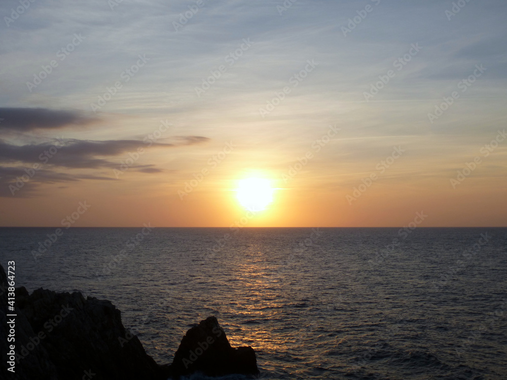Orange sunset in Menorca, Balearic Islands, Spain; Europe