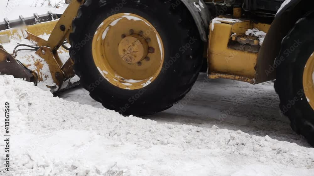 Snow removal with a tractor. Snow removal with a tractor.