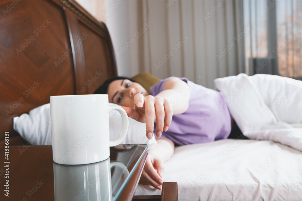 Close-up of female hands with a mug of drink. Close-up of female hands with a mug of drink.